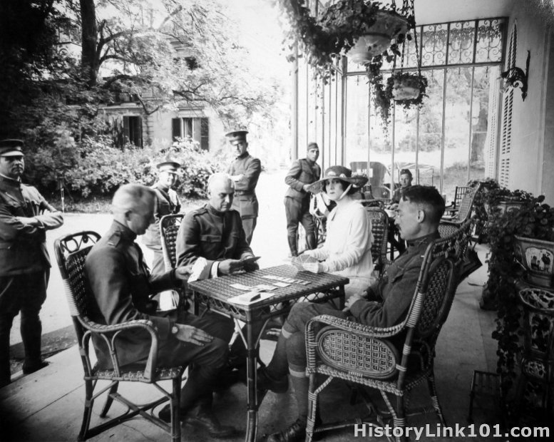 Mrs. W.E. Corey playing cards with the Wounded Officers