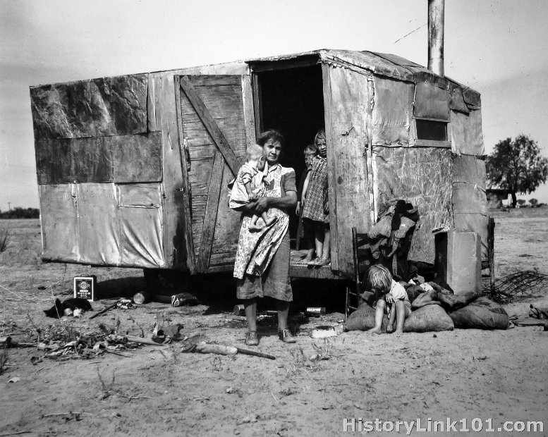  A migratory family living in a trailer in an open field