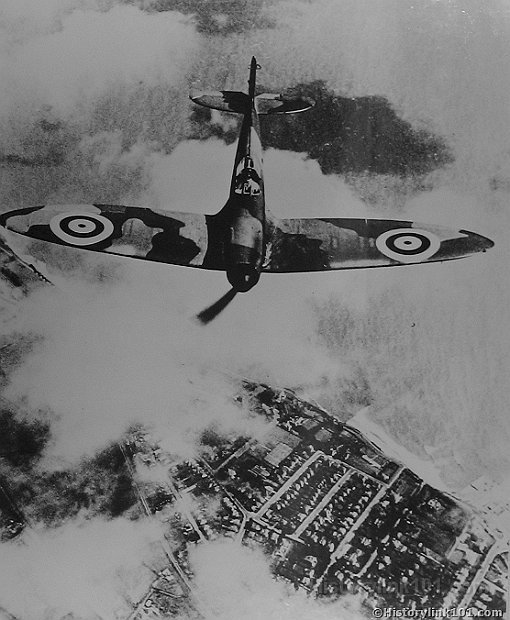 Spitfire over city 