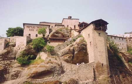 greek monaster on cliffside