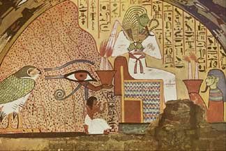 A dead man kneels before Osiris
