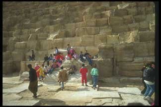 people sit on pyramid at giza