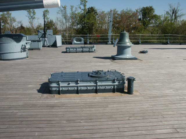 Royalty Free Picture of Battleship North Carolina's  Deck Hatch Behind 16 inch Gun, Aft Deck
