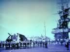 Crew and planes on the deck of  USS Santee